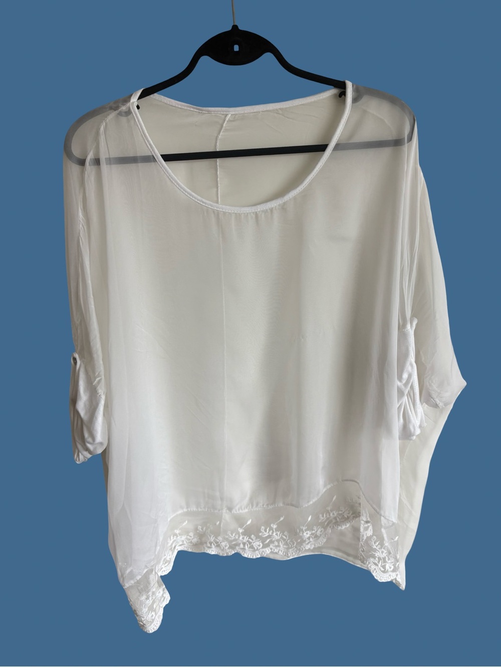 Sheer White Silk Women's Blouse with lace hem.